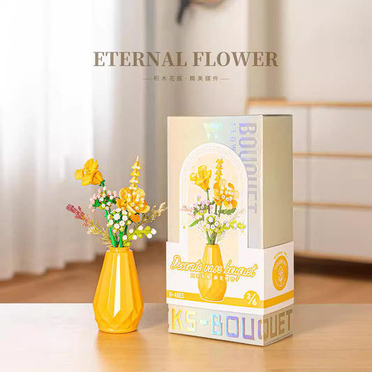 Boeket bloemen in gele vaas