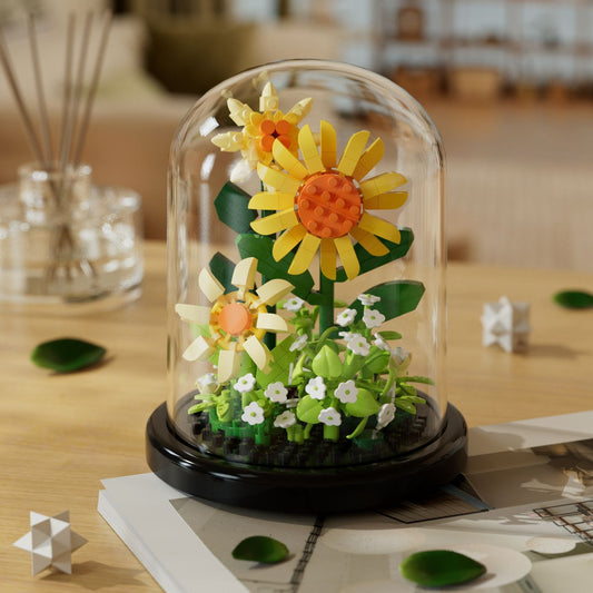 Gele bloemen in stolp